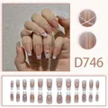 Detailed view of pink French tip press-on nails with white cross lines and pearls - French Pearl Bow Tie Style (D746) / 24 Pcs/Set