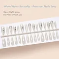Macro detail of translucent white press-on nails with butterfly and rhinestone accents - Butterfly Cat Eye Style (MD389-T) / 30 Packs