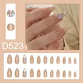 Faux ongles amande nude élégants avec des paillettes et des accents de strass fins - Nude Abricot Paillettes Strass Lignes Style Amande (D523) / 24 Pièces/Ensemble