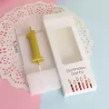 Detailed view of a 5.2cm gold metallic number 1 birthday candle in its white retail box - Number 1 / Single Piece / Gold