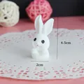 Detailed view of a cute white rabbit miniature figurine with 4.5cm height dimension markings - Half-body Rabbit