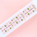 Detail view of 30pcs frog prince themed press-on nails on a soft pink background - Frog Prince Theme Style (S071-T) / 30 Pieces/Strip (Includes XS/S/M Sizes)
