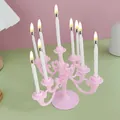 Pink vintage plastic candelabra with 9 white spiral candles for birthday party decor - Pink