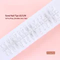 Detail view of 30-piece strip of transparent ice flower press-on nails with glitter - New Chinese Style Ice Flower Pattern (S075-T) / 30 Pieces/Strip (Includes XS/S/M Sizes)