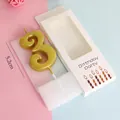 Detailed view of a gold number 3 birthday candle with 5.2cm height and packaging - Number 3 / Single Piece / Gold