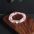 Detailed view of pink opal and crystal beaded double-layer bracelet with pearl - Pink