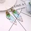 Elegante Ohrringe mit Schmetterlingsflügel-Verlauf und funkelnden schillernden Strasssteinen - Bronze - Grüner Strass