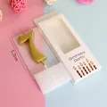 Golden number 7 birthday candle shown with 5.2cm height measurement and gift packaging - Number 7 / Single Piece / Gold