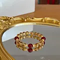 Φυσικό βραχιόλι 10mm από κίτρινο κιτρίνη και κόκκινο αχάτη με χρυσά διακοσμητικά - Κίτρινο (Στιλ Κόκκινη Χάντρα Πρωτοχρονιάς)