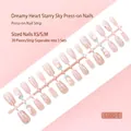 Glittery nude press-on nails with heart and star patterns on a 30-piece strip - Dreamy Starry Sky Style (S100-T) / 30 Packs / Icy Transparent Nude Pink