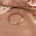 Elegant natural strawberry quartz beaded bracelet with pearl and rainbow airplane charm - Rainbow Style
