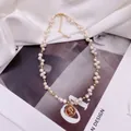 Elegant woven freshwater pearl necklace featuring a gold Elizabeth II coin pendant - Necklace Style (Decorated with Four Pearls) / Gold