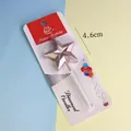 Primer plano de una vela de cumpleaños en forma de estrella oro rosa metalizado pack - Estrella Con Strass / Rosa oro