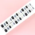 Set de 30 faux ongles à motif vache et noirs, disponible en tailles XS, S et M - Tailles Mixtes XS/S/M / Style Motif Vache Noir et Blanc (S109-T) / Pack de 30