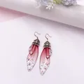 Lange Ohrringe mit Schmetterlingsflügeln, rosa Farbverlauf und glitzernden Kristallen - Bronze - Rosarot Strass