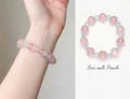 Elegantes Naturkristall-Armband in Rosa und Hellblau, Variante im Sea Salt Peach Stil - Meersalz Pfirsich Armband / Blau Rosa
