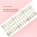 Elegant 30pcs creamy white press-on nails featuring traditional Chinese ink floral patterns - Elegant Jiangnan Chinese Style (S132-T) / 30 Pieces/Strip (Includes XS/S/M Sizes)