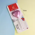 Detalle de vela de cumpleaños diamante en forma de corazón rosa con medida de 4cm. - Corazón de Diamante / Rosa
