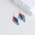Gradient butterfly wing earrings with iridescent rhinestones and vintage gold hooks. - Rainbow Rhinestone Style / Multicolor