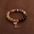 Elegantes Naturstein-Perlenarmband mit einem funkelnden Kristall-Schmetterlingsanhänger. - Mehrschatz Schmetterlings Armband / bunt