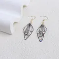 Exquisite translucent cicada wing drop earrings with sparkling rhinestones in gold - Zirconia Style / Gray