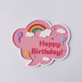 Detailed macro view of pink cloud cake topper with rainbow and Happy Birthday text - Pink Writable Rainbow Topper / Pink