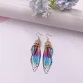 Elegante Ohrringe mit Farbverlauf Zikadenflügel, Goldfolie und funkelndem Kristall - Goldfolie - Regenbogen