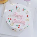 Detailed view of a white cake featuring a pink 'Happy Birthday' topper and red flowers - Pink Soft Glue Birthday Letters