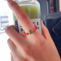 Handmade natural stone beaded ring featuring vibrant red beads and a green center stone - Southern Red Jasper Ring
