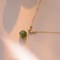 Vintage style 14K gold-plated necklace featuring a smooth green gemstone bead pendant. - Clavicle Chain Style (Y-0412) / Hetian Jade