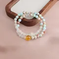 Detail view of double-layer beaded bracelet with natural Shoushan stone and citrine beads - Double Wrap Bracelet / Shoushan Stone Green Jadeite Running Ring Bracelet