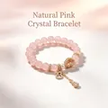 Elegantes Armband aus natürlichen rosa Kristallperlen mit feinen goldenen Herzanhängern und Quasten - Rosa Flaschenkürbis Kristall Armband / Rosa