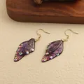 Vintage purple resin butterfly wing earrings with glitter, rhinestones and gold-tone hooks. - New Rhinestone Design / Purple