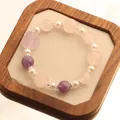 Elegant natural amethyst and rose quartz beaded bracelet with pearls and carved fox charm. - Amethyst Rose Quartz Gourd Bracelet