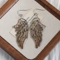 Elegante Schmetterlingsflügel-Ohrhänger aus Acryl mit schillernden Strasssteinen für Damen - Grau-Silberner Strass