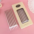 Pack of 12 metallic rose gold long slender pencil birthday candles in kraft paper box. - 12 PCS / Rose Gold