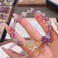 12mm natural purple amethyst and clear crystal beaded bracelet with gold accents - Super Seven Running Ring Ball Style / Purple