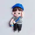Adorable handmade soft clay boy figurine cake topper wearing blue hat and striped shirt - Boy with Cup