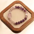 Natural 12mm purple amethyst bead bracelet with fox centerpiece on wood display - Nine-Tailed Fox Carving Style / Purple