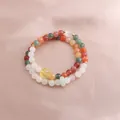 Close-up of multicolor beaded double strand bracelet with a jade-like ring detail. - Double Wrap Bracelet / Multicolor Gold Silk Jade Running Ring Bracelet