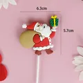 Décoration de gâteau Père Noël en caoutchouc souple pour pâtisserie de Noël avec dimensions - Père Noël offrant un Cadeau (3018)