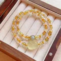 Double-strand citrine bracelet with carved cat charm and moonstone bead in wooden box. - Carved Cat Style