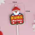 Topper de gâteau décoratif Père Noël en PVC souple avec inscription Merry Christmas - Père Noël tenant un Panneau (3011)