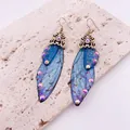 Vintage cicada wing earrings in blue with shimmering glitter and iridescent gems. - Antique Bronze Hook / Dreamy Blue