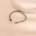 Detailed view of labradorite beaded bracelet with amethyst and white jade flower charm - Chalcedony Flower Style