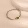 Detailed view of handcrafted Moonstone and green Chalcedony beaded bracelet with Agate. - Green Natural Stone Style