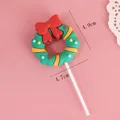 Decoración de pastel corona de Navidad con lazo rojo, 4,9 cm sobre fondo rosa - Estilo de Corona de Navidad