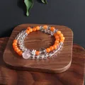 Close-up of a double-layer natural crystal bracelet featuring sunstone and rose quartz beads. - Golden Sunstone Moonstone Double Layer Bracelet
