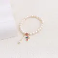 Elegant freshwater pearl bracelet with colorful zircon cross and strawberry crystal. - Cross Style