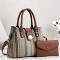 Close-up of a two-piece woven handbag and clutch set with brown leather accents - 28*13*21cm / Gray